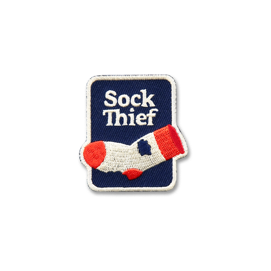 Scout's Honour Sock Thief -silitettävä kangasmerkki koiralle